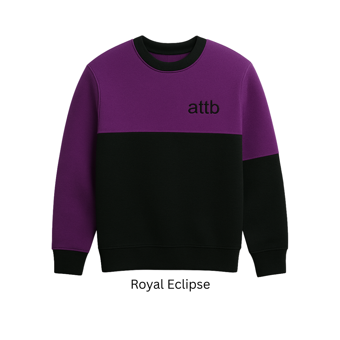 The “Royal Eclipse” Crewneck from ATTB (Among The Top Best) captures a bold